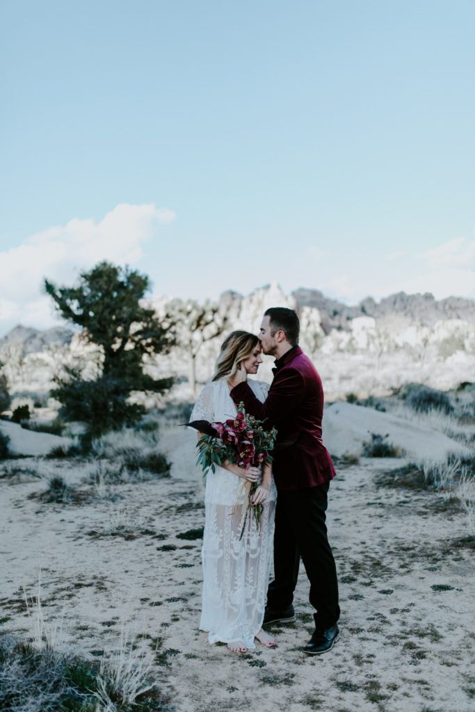 Jeremy kisses Alyssa during their elopement ceremony in Joshua Tree National Park.