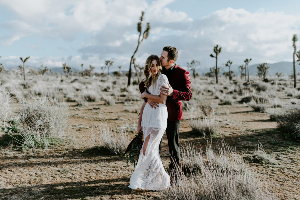 Jeremy kisses Alyssa after their elopement ceremony in Joshua Tree National Park.