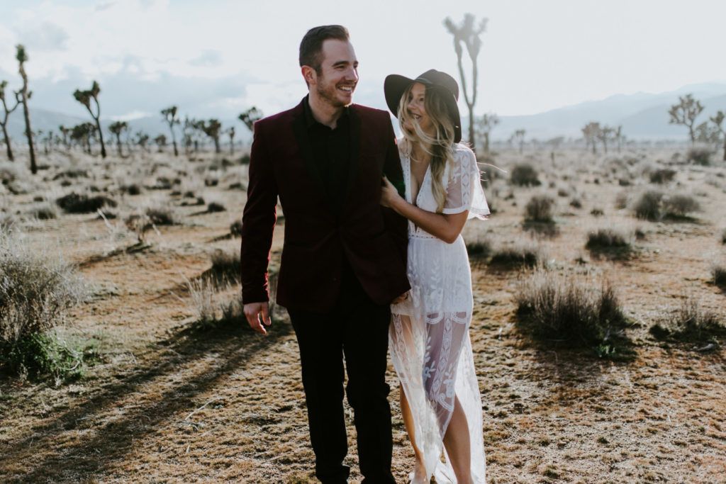 Alyssa holds onto Jeremy after their elopement ceremony in Joshua Tree National Park.