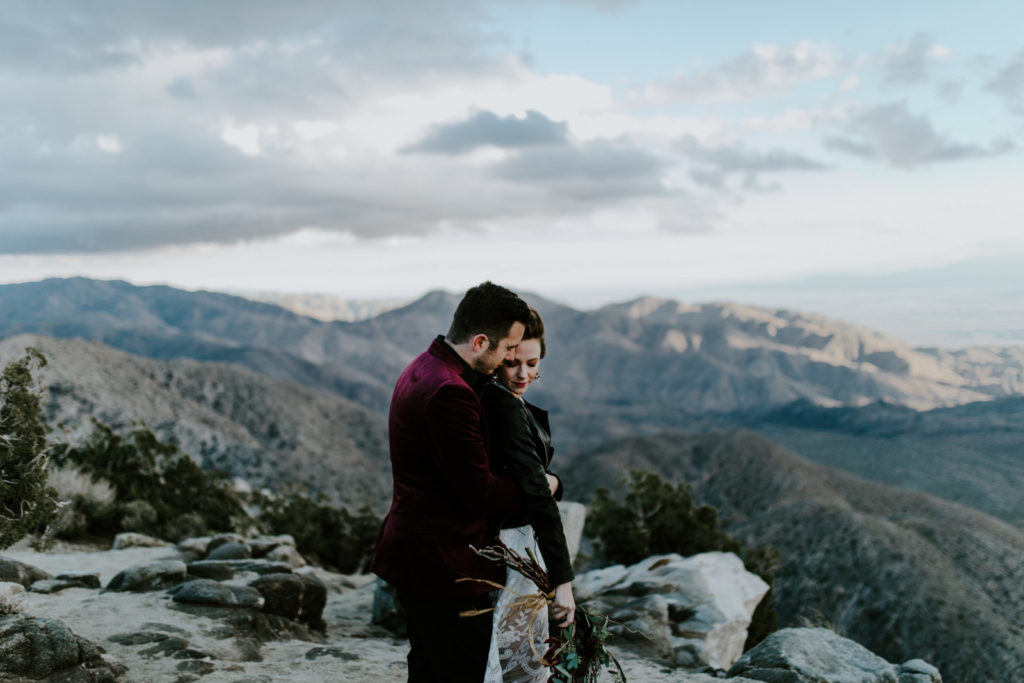 Jeremy hugs Alyssa after their elopement in Joshua Tree National Park.