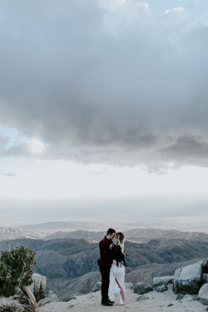 Jeremy and Alyssa stand at Keys Point after their elopement ceremony in Joshua Tree National Park.