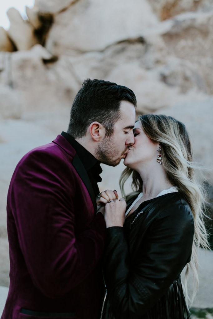 Jeremy and Alyssa kiss in Joshua Tree National Park.